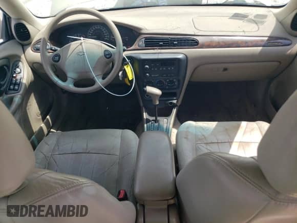 2003 Chevrolet Malibu LS z VIN 1G1NE52JX3M656822, wystawiony jako Copart lot #68388524 z przebiegiem 161 222 mil mil oraz Szkoda całkowita • Salvage title. Historia ofert i sprzedaży dostępna na DreamBid. Obrazek 8.