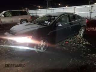 2015 Volvo S60 T5 Premier с VIN YV1612TB6F2309303, выставлен на аукционе Copart как лот 82916804 с пробегом 166 112 миль миль и Списание • Salvage title. История ставок и продаж доступна на DreamBid. Изображение 1.