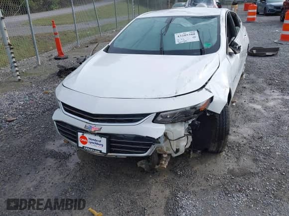 2018 Chevrolet Malibu LS z VIN 1G1ZB5ST7JF277595, wystawiony jako IAAI lot #43289380 z przebiegiem 62 729 mil mil oraz . Historia ofert i sprzedaży dostępna na DreamBid. Obrazek 6.