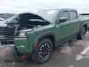 2023 Nissan Frontier SV with VIN 1N6ED1EK3PN642166, listed as a IAAI auction lot 43036612 with 12,295 mi miles and . Bid and sale history available at DreamBid. Image 2.