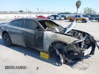 2023 Dodge Charger SXT with VIN 2C3CDXBG5PH600477, listed as a IAAI auction lot 42749785 with Not provided miles and . Bid and sale history available at DreamBid. Image 1.