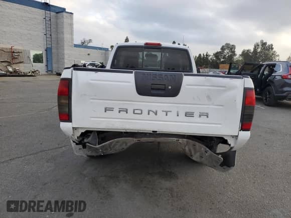 2001 Nissan Frontier XE with VIN 1N6DD21S41C353033, listed as a Copart auction lot 81809955 with 100,722 mi miles and Salvage title. Bid and sale history available at DreamBid. Image 6.