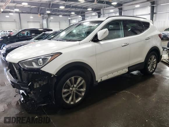 2018 Hyundai Santa Fe 2.0T с VIN 5XYZUDLA5JG512405, выставлен на аукционе Copart как лот 80729765 с пробегом 119 825 миль миль и Списание • Salvage title. История ставок и продаж доступна на DreamBid. Изображение 1.