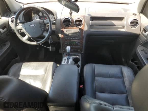 2006 Ford Freestyle Limited z VIN 1FMDK06116GA45147, wystawiony jako Copart lot #53699895 z przebiegiem Nie podano mil oraz Szkoda całkowita • Salvage title. Historia ofert i sprzedaży dostępna na DreamBid. Obrazek 8.