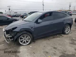 2023 Tesla Model Y with VIN 7SAYGDED1PF956023, listed as a Copart auction lot 49003915 with 8,360 mi miles and Salvage title. Bid and sale history available at DreamBid. Image 1.
