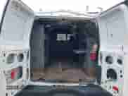 2010 Ford Econoline Cargo Commercial z VIN 1FTNE2EL1ADA99282, wystawiony jako IAAI lot #42604073 z przebiegiem 128 942 mil mil oraz . Historia ofert i sprzedaży dostępna na DreamBid. Obrazek 8.