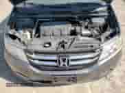 2014 Honda Odyssey LX z VIN 5FNRL5H25EB073844, wystawiony jako Copart lot #71624895 z przebiegiem 169 387 mil mil oraz Szkoda całkowita • Salvage title. Historia ofert i sprzedaży dostępna na DreamBid. Obrazek 12.