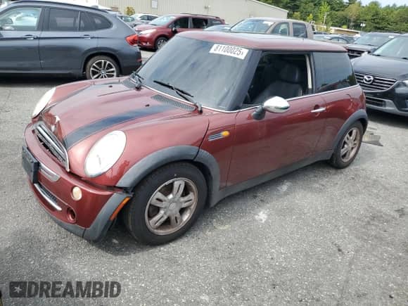 2006 MINI Hardtop with VIN WMWRC33526TK66647, listed as a Copart auction lot 81100025 with 179,203 mi miles and Salvage title. Bid and sale history available at DreamBid. Image 1.