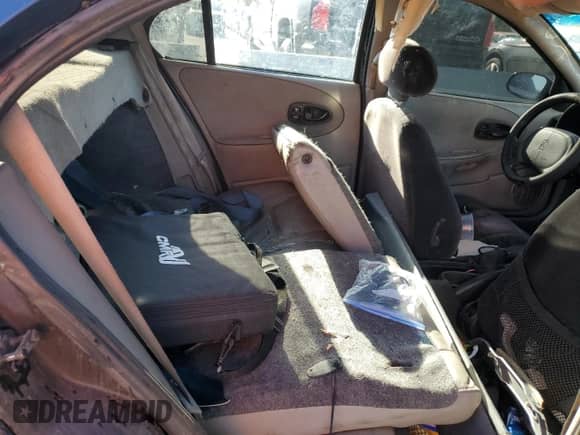 1999 Saturn SL with VIN 1G8ZJ5272XZ141986, listed as a Copart auction lot 71496674 with Not provided miles and Salvage title. Bid and sale history available at DreamBid. Image 10.