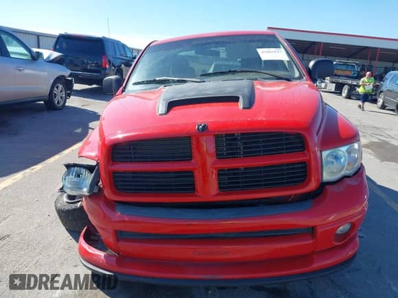 2004 Dodge 1500 SLT with VIN 1D7HU18D14J203120, listed as a IAAI auction lot 43065517 with 294,685 mi miles and . Bid and sale history available at DreamBid. Image 12.