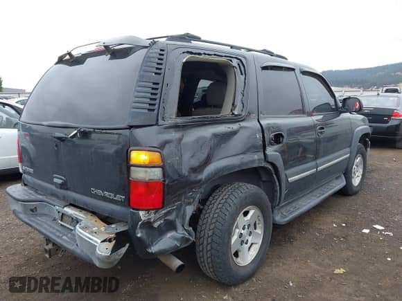 2005 Chevrolet Tahoe Z71 with VIN 1GNEK13T85R199417, listed as a IAAI auction lot 43228579 with 326,516 mi miles and . Bid and sale history available at DreamBid. Image 4.