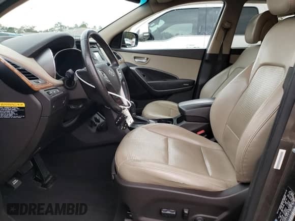 2014 Hyundai Santa Fe с VIN 5XYZU3LA3EG212720, выставлен на аукционе Copart как лот 82893124 с пробегом 134 404 миль миль и Списание • Salvage title. История ставок и продаж доступна на DreamBid. Изображение 7.