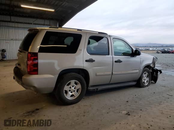 2007 Chevrolet Tahoe LS с VIN 1GNFC13C37J392786, выставлен на аукционе Copart как лот 81931635 с пробегом 179 423 миль миль и Списание • Salvage title. История ставок и продаж доступна на DreamBid. Изображение 3.