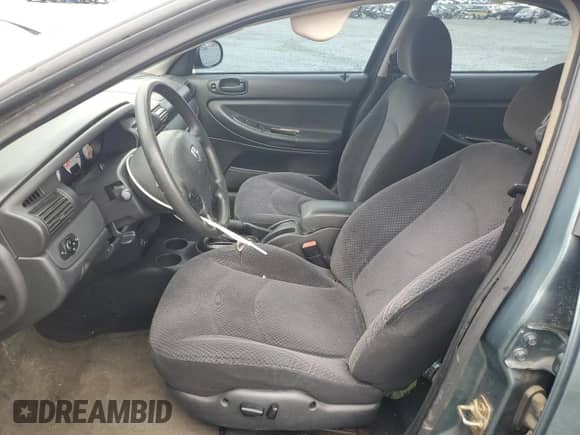 2005 Dodge Stratus SXT with VIN 1B3EL46T25N633939, listed as a Copart auction lot 71744064 with 197,696 mi miles and Salvage title. Bid and sale history available at DreamBid. Image 7.