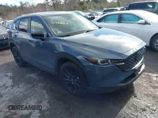 2022 Mazda CX-5 S Carbon Edition z VIN JM3KFBCM7N0579780, wystawiony jako IAAI lot #41460860 z przebiegiem 43 479 mil mil oraz . Historia ofert i sprzedaży dostępna na DreamBid. Obrazek 1.
