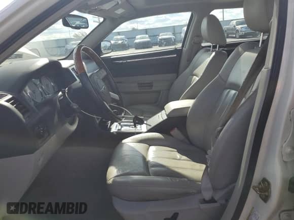 2006 Chrysler 300 C with VIN 2C3LA63H86H499430, listed as a Copart auction lot 85904135 with 135,529 mi miles and Salvage title. Bid and sale history available at DreamBid. Image 7.