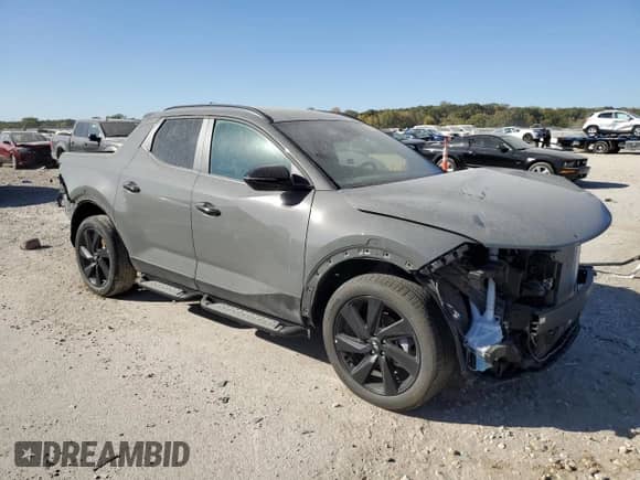 2024 Hyundai Santa Cruz Night Edition с VIN 5NTJCDDF7RH105623, выставлен на аукционе Copart как лот 75869034 с пробегом 2 397 миль миль и Списание • Salvage title. История ставок и продаж доступна на DreamBid. Изображение 4.