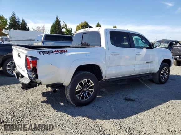 2022 Toyota Tacoma SR с VIN 3TMCZ5AN1NM504958, выставлен на аукционе Copart как лот 81156135 с пробегом 26 327 миль миль и Списание • Salvage title. История ставок и продаж доступна на DreamBid. Изображение 3.