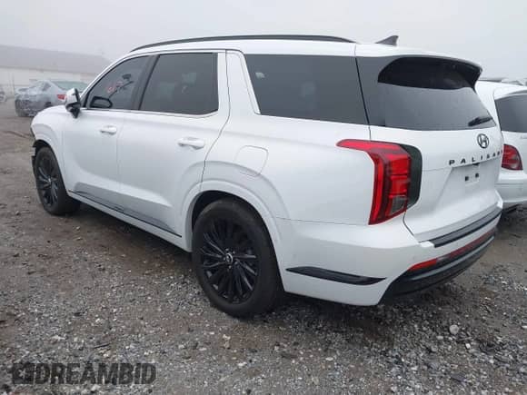 2024 Hyundai Palisade Calligraphy z VIN KM8R7DGE1RU735874, wystawiony jako IAAI lot #41021617 z przebiegiem 6 926 mil mil oraz . Historia ofert i sprzedaży dostępna na DreamBid. Obrazek 3.