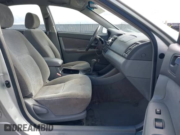 2002 Toyota Camry LE с VIN JTDBE32K120082124, выставлен на аукционе IAAI как лот 43302258 с пробегом 215 577 миль миль и . История ставок и продаж доступна на DreamBid. Изображение 5.