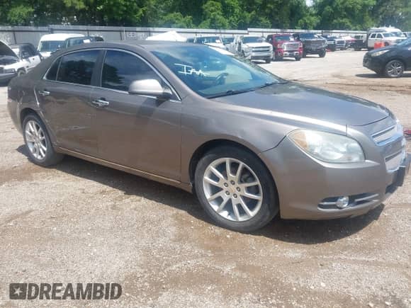 2012 Chevrolet Malibu LTZ z VIN 1G1ZG5E73CF146618, wystawiony jako IAAI lot #42333042 z przebiegiem 192 772 mil mil oraz . Historia ofert i sprzedaży dostępna na DreamBid. Obrazek 1.