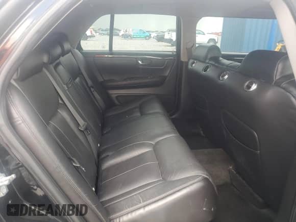 2009 Cadillac DTS Professional Limousine с VIN 1GEEK90Y69U550200, выставлен на аукционе Copart как лот 80572365 с пробегом 55 995 миль миль и Списание • Salvage title. История ставок и продаж доступна на DreamBid. Изображение 11.