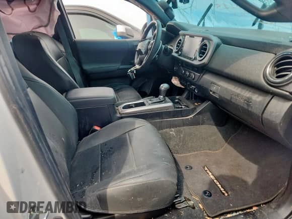 2023 Toyota Tacoma SR z VIN 3TYRZ5CN5PT033640, wystawiony jako Copart lot #69745075 z przebiegiem 14 471 mil mil oraz Szkoda całkowita • Salvage title. Historia ofert i sprzedaży dostępna na DreamBid. Obrazek 7.