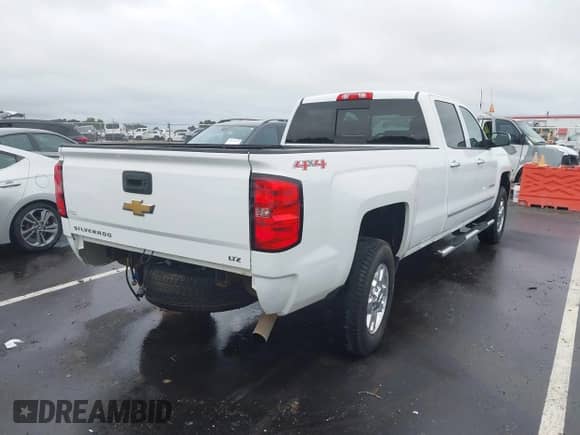 2015 Chevrolet Silverado 2500HD LTZ с VIN 1GC1KWEG9FF120280, выставлен на аукционе IAAI как лот 42916797 с пробегом 148 224 миль миль и . История ставок и продаж доступна на DreamBid. Изображение 4.