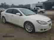 2011 Chevrolet Malibu LTZ with VIN 1G1ZE5E14BF314041, listed as a Copart auction lot 85567205 with 136,707 mi miles and Salvage title. Bid and sale history available at DreamBid. Image 4.