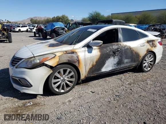 2016 Hyundai Azera Limited с VIN KMHFH4JG4GA523849, выставлен на аукционе Copart как лот 84760875 с пробегом Не указан миль и Списание • Salvage title. История ставок и продаж доступна на DreamBid. Изображение 1.