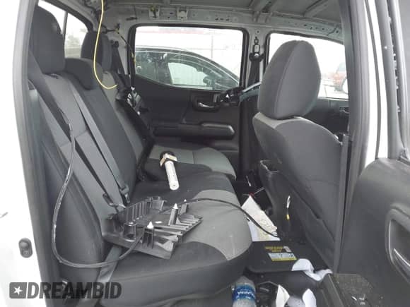 2021 Toyota Tacoma SR5 with VIN 5TFAZ5CN4MX111100, listed as a IAAI auction lot 42570230 with 54,460 mi miles and . Bid and sale history available at DreamBid. Image 8.