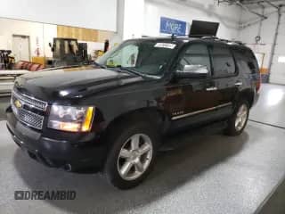 2012 Chevrolet Tahoe LTZ с VIN 1GNSCCE04CR236233, выставлен на аукционе Copart как лот 59973195 с пробегом 140 105 миль миль и Чистый • Clean title. История ставок и продаж доступна на DreamBid. Изображение 1.