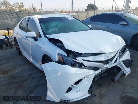 2023 Toyota Camry SE with VIN 4T1G11AK2PU742545, listed as a IAAI auction lot 43325664 with 56,037 mi miles and . Bid and sale history available at DreamBid. Image 1.