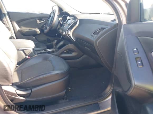 2013 Hyundai Tucson GLS with VIN KM8JU3AC0DU687400, listed as a IAAI auction lot 43191184 with 130,345 mi miles and . Bid and sale history available at DreamBid. Image 5.