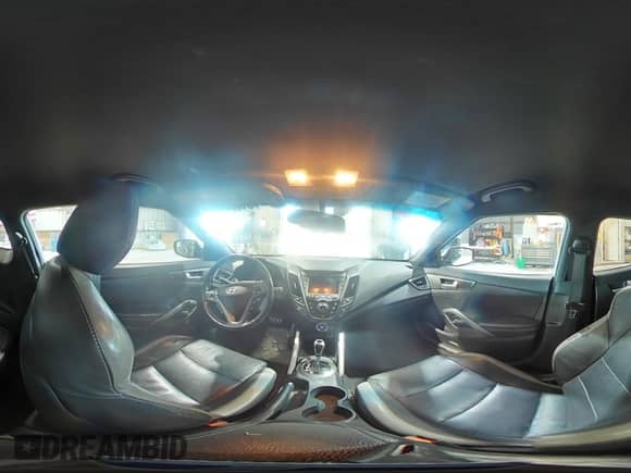 2016 Hyundai Veloster Turbo с VIN KMHTC6AE7GU283559, выставлен на аукционе Copart как лот 61600565 с пробегом Не указан миль и Списание • Salvage title. История ставок и продаж доступна на DreamBid. Изображение 16.