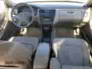 1999 Honda Accord EX with VIN 1HGCG1650XA052672, listed as a Copart auction lot 48684895 with 77,694 mi miles and Salvage title. Bid and sale history available at DreamBid. Image 8.