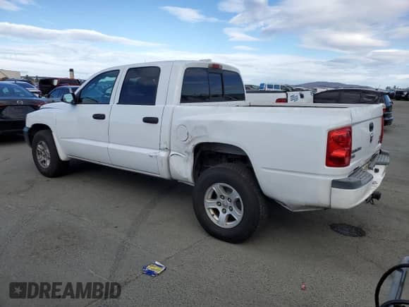 2007 Dodge Dakota SLT with VIN 1D7HW48P57S151513, listed as a Copart auction lot 86495985 with 170,024 mi miles and Salvage title. Bid and sale history available at DreamBid. Image 2.