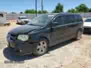 2013 Dodge Grand Caravan Crew with VIN 2C4RDGDG2DR700268, listed as a Copart auction lot 57086795 with 154,006 mi miles and Salvage title. Bid and sale history available at DreamBid. Image 1.