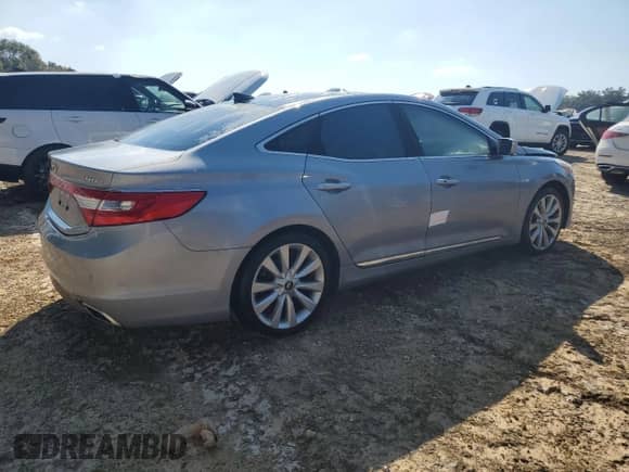 2015 Hyundai Azera Limited с VIN KMHFH4JG0FA480156, выставлен на аукционе Copart как лот 76272794 с пробегом 113 156 миль миль и Списание • Salvage title. История ставок и продаж доступна на DreamBid. Изображение 3.