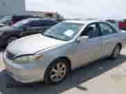 2005 Toyota Camry LE с VIN 4T1BF30K25U606910, выставлен на аукционе IAAI как лот 42322892 с пробегом 144 835 миль миль и . История ставок и продаж доступна на DreamBid. Изображение 2.