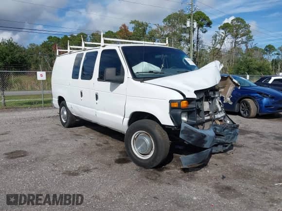 2013 Ford Econoline Cargo Commercial with VIN 1FTNE2EW0DDA41310, listed as a IAAI auction lot 43405112 with 185,163 mi miles and . Bid and sale history available at DreamBid. Image 1.