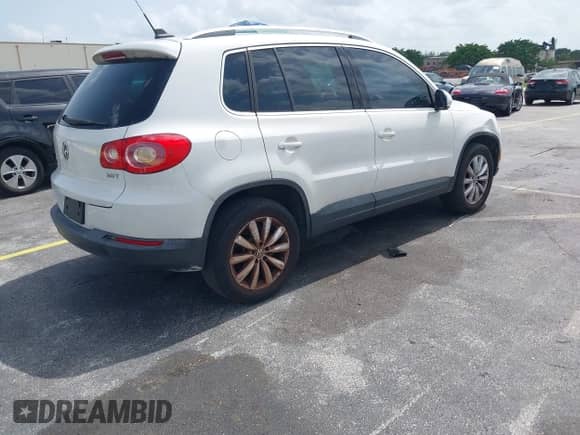 2011 Volkswagen Tiguan S with VIN WVGAV7AX9BW514225, listed as a IAAI auction lot 42461785 with 128,973 mi miles and . Bid and sale history available at DreamBid. Image 4.