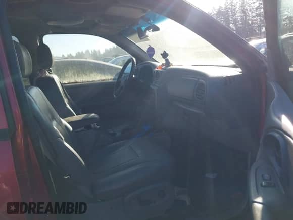 2002 Chevrolet TrailBlazer LS z VIN 1GNDT13S722423460, wystawiony jako IAAI lot #41401201 z przebiegiem 203 385 mil mil oraz . Historia ofert i sprzedaży dostępna na DreamBid. Obrazek 5.