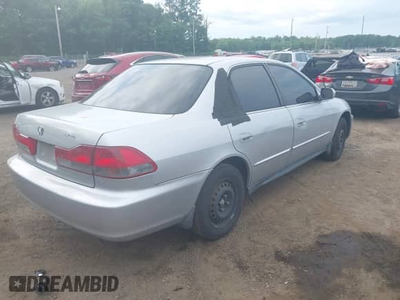 2002 Honda Accord LX with VIN 1HGCG56482A044147, listed as a IAAI auction lot 42780944 with 137,704 mi miles and . Bid and sale history available at DreamBid. Image 4.