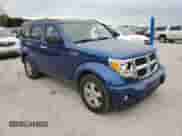 2009 Dodge Nitro SE with VIN 1D8GU28K19W512589, listed as a Copart auction lot 51421254 with 219,813 mi miles and Salvage title. Bid and sale history available at DreamBid. Image 4.