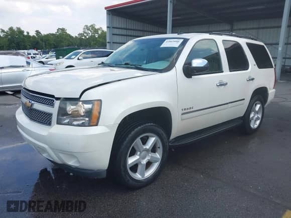 2011 Chevrolet Tahoe LTZ with VIN 1GNSCCE09BR248960, listed as a IAAI auction lot 42869086 with 240,413 mi miles and . Bid and sale history available at DreamBid. Image 2.
