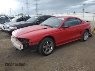 1996 Ford Mustang GT z VIN 1FALP42X0TF122486, wystawiony jako Copart lot #65025445 z przebiegiem 50 598 mil mil oraz Szkoda całkowita • Salvage title. Historia ofert i sprzedaży dostępna na DreamBid. Obrazek 1.