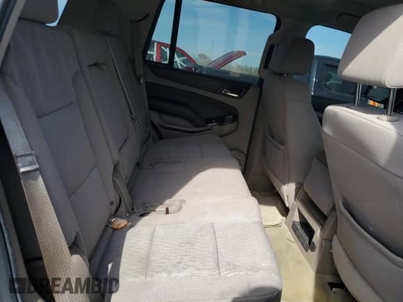 2016 Chevrolet Tahoe LS z VIN 1GNSKAEC9GR371862, wystawiony jako Copart lot #53430955 z przebiegiem 163 950 mil mil oraz Szkoda całkowita • Salvage title. Historia ofert i sprzedaży dostępna na DreamBid. Obrazek 11.