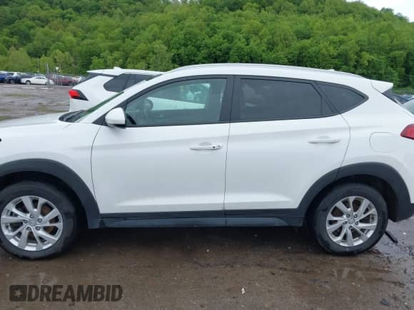 2021 Hyundai Tucson Value z VIN KM8J3CA41MU327869, wystawiony jako IAAI lot #42241877 z przebiegiem 122 285 mil mil oraz . Historia ofert i sprzedaży dostępna na DreamBid. Obrazek 15.