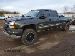 2003 Chevrolet Silverado 2500HD LS with VIN 1GCHK23143F107714, listed as a Copart auction lot 82587134 with 178,354 mi miles and Salvage title. Bid and sale history available at DreamBid. Image 1.